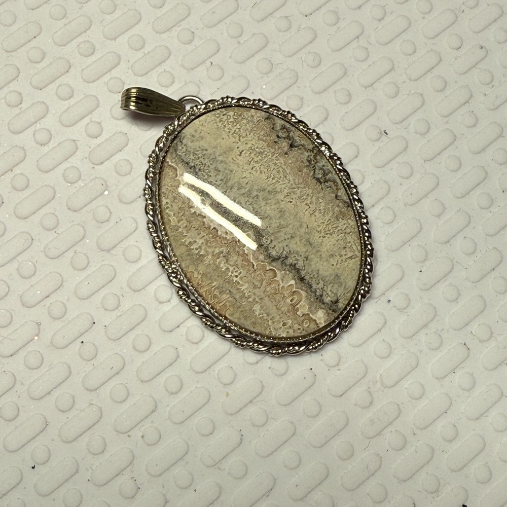 63.)Elegant Silver and Cream Pendant